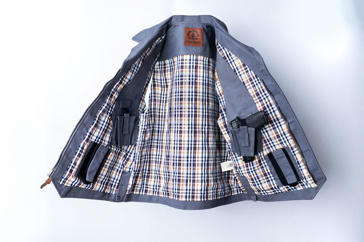Iron Tradesman grey vest open interior with plaid lining and concealed carry pockets. USA Made
