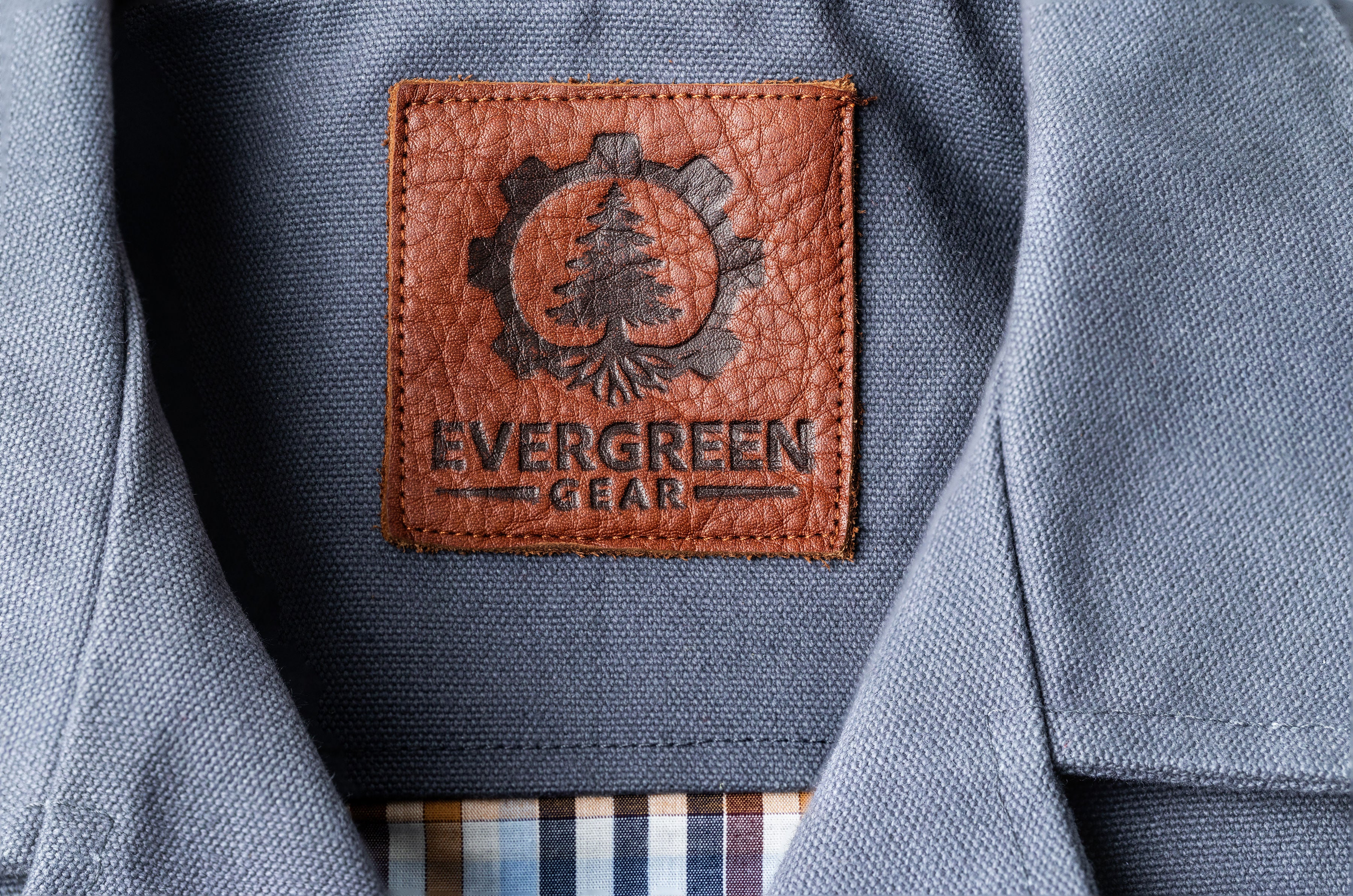 Evergreen Gear leather label inside the grey Iron Tradesman vest
